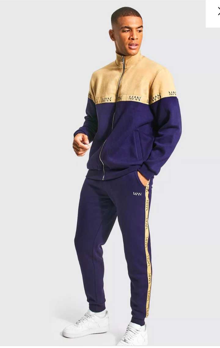 Man zip through funnel neck tape tracksuit